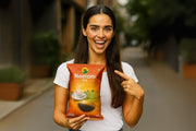 Woman holding a Neelam Tea bag 